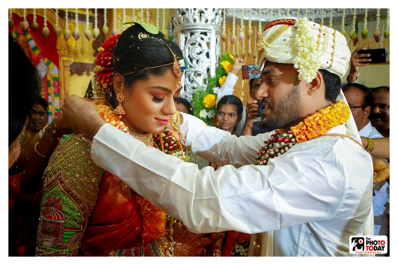 Showers of rice and flowers,beating of the Melam and blowing of the Nadaswaram,here is the first knot!!